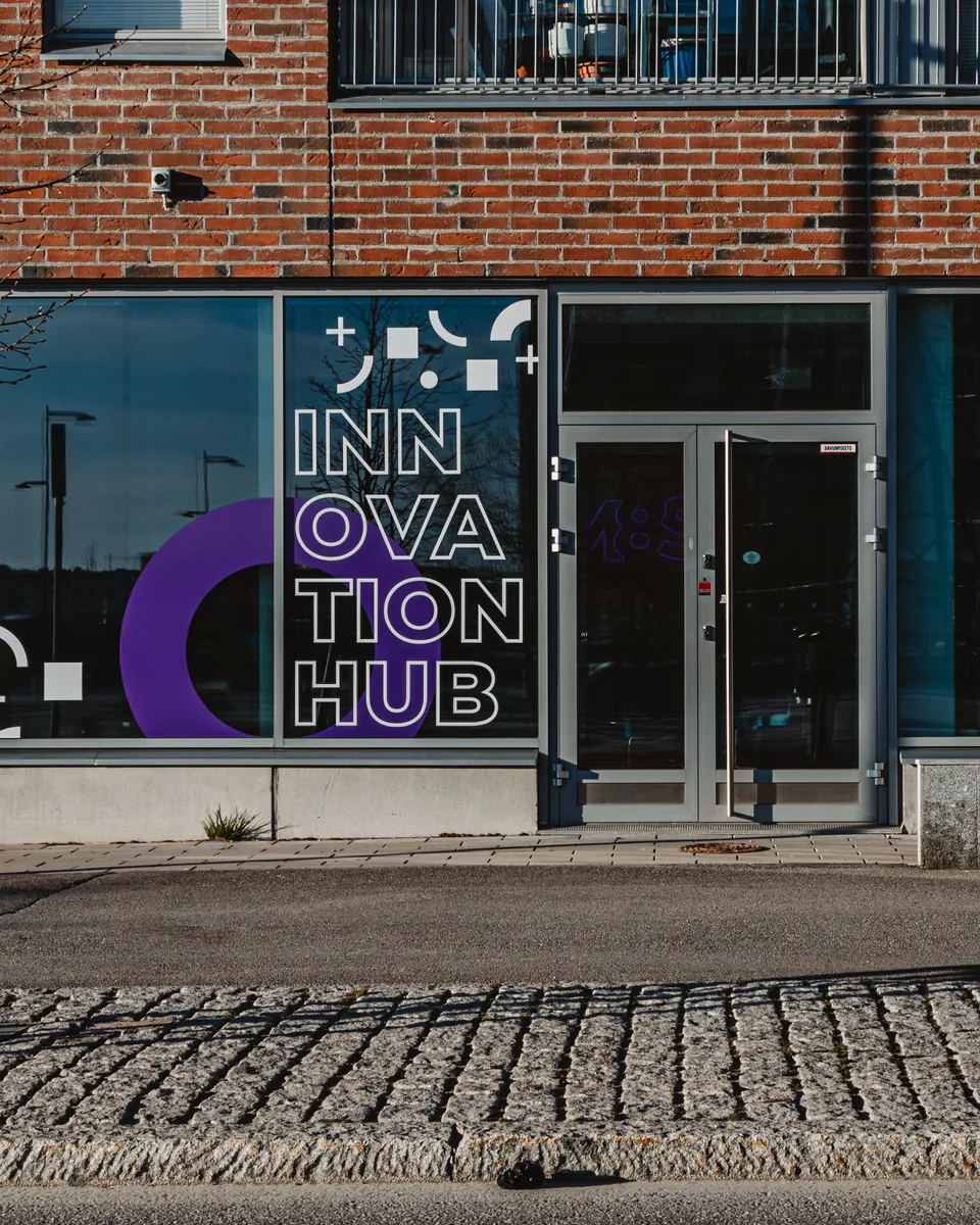 M8S Hub facade on Arielinkatu with Innovation Hub window graphics
